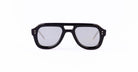 Black, thick-rimmed Thom Browne sunglasses with gray lenses and a flat top design.