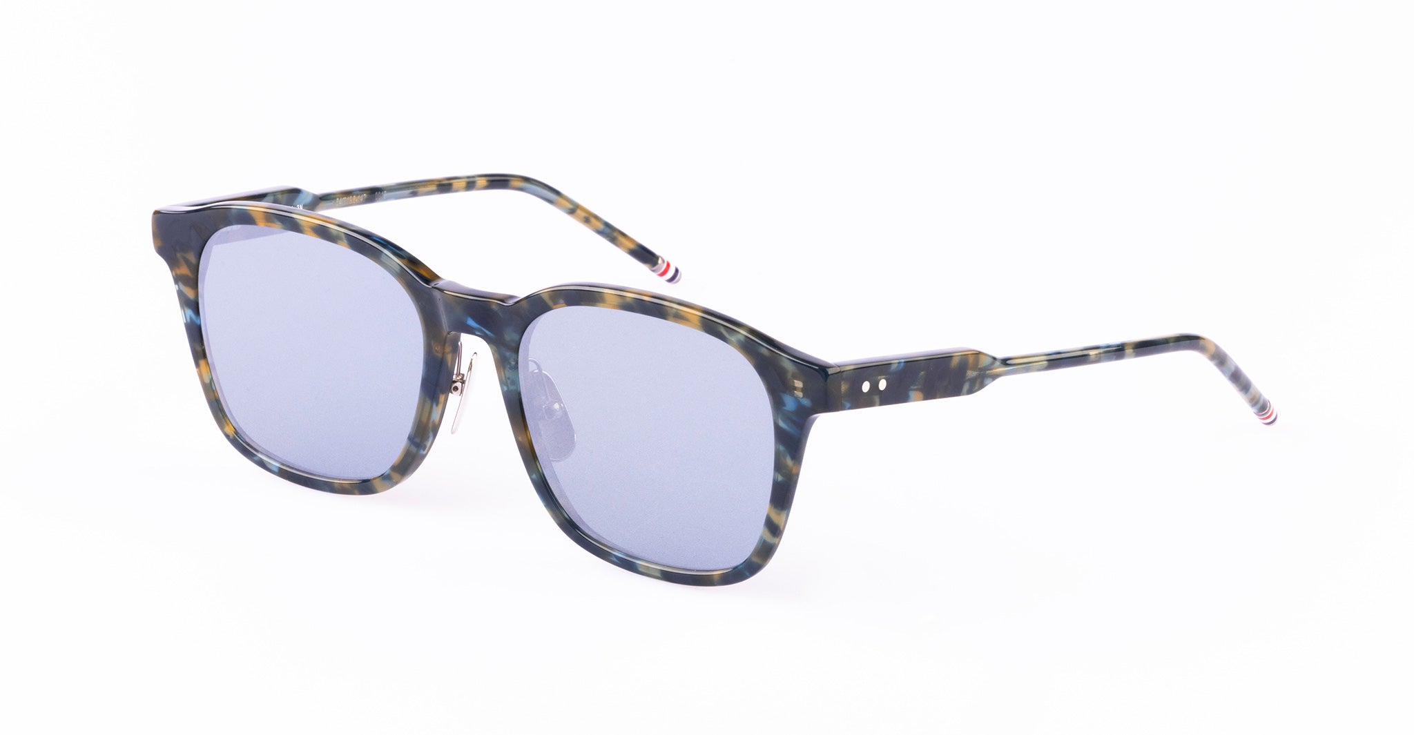Thom Browne 934 rectangular tortoiseshell sunglasses with blue tinted lenses and slim arms, front view.