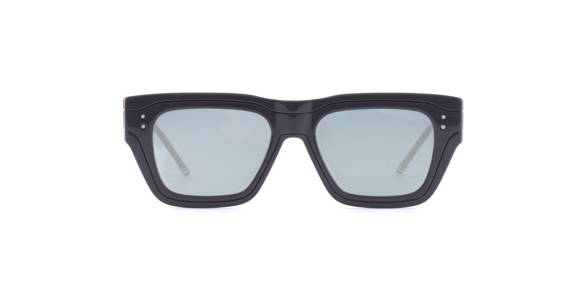 Thom Browne 947 sunglasses with thick black rectangular frames and light blue-tinted lenses, shown from a front-facing angle.