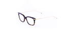 Thom Browne 701 eyeglasses feature a classic rectangular tortoiseshell frame with thin gold metal arms, shown from the front angle.
