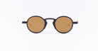 Thom Browne 931 round sunglasses, navy blue frames, brown-tinted lenses, front view.