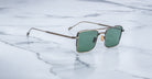 Angled view of the Jacques Marie Mage Altamont style sunglasses in Gold Antique