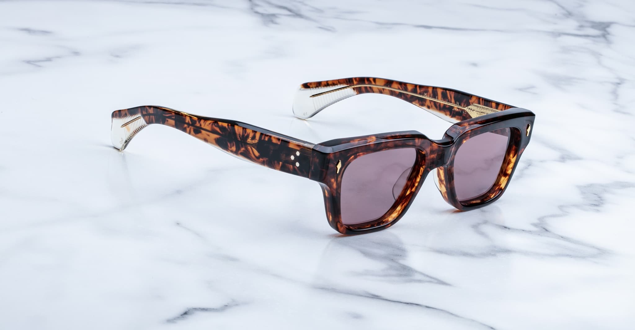 Jacques Marie Mage Fellini sunglasses with dark polarized lenses shown from above.