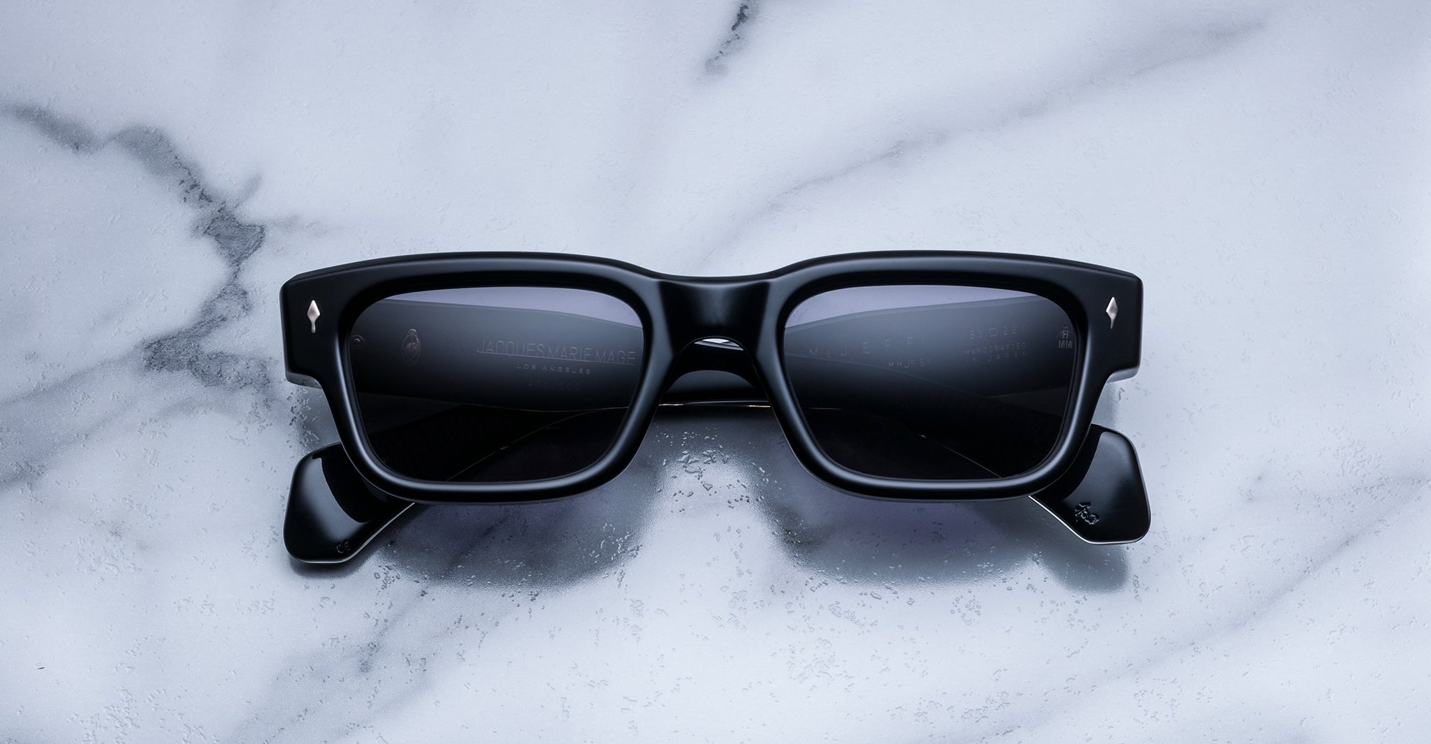 Jacques Marie Mage Jeff black rectangular sunglasses with dark lenses, top view showing full frame and lens shape.
