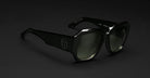 Jacques Marie Mage Gloria black rectangular sunglasses with UV lenses and temple logo, shown from the side angle.