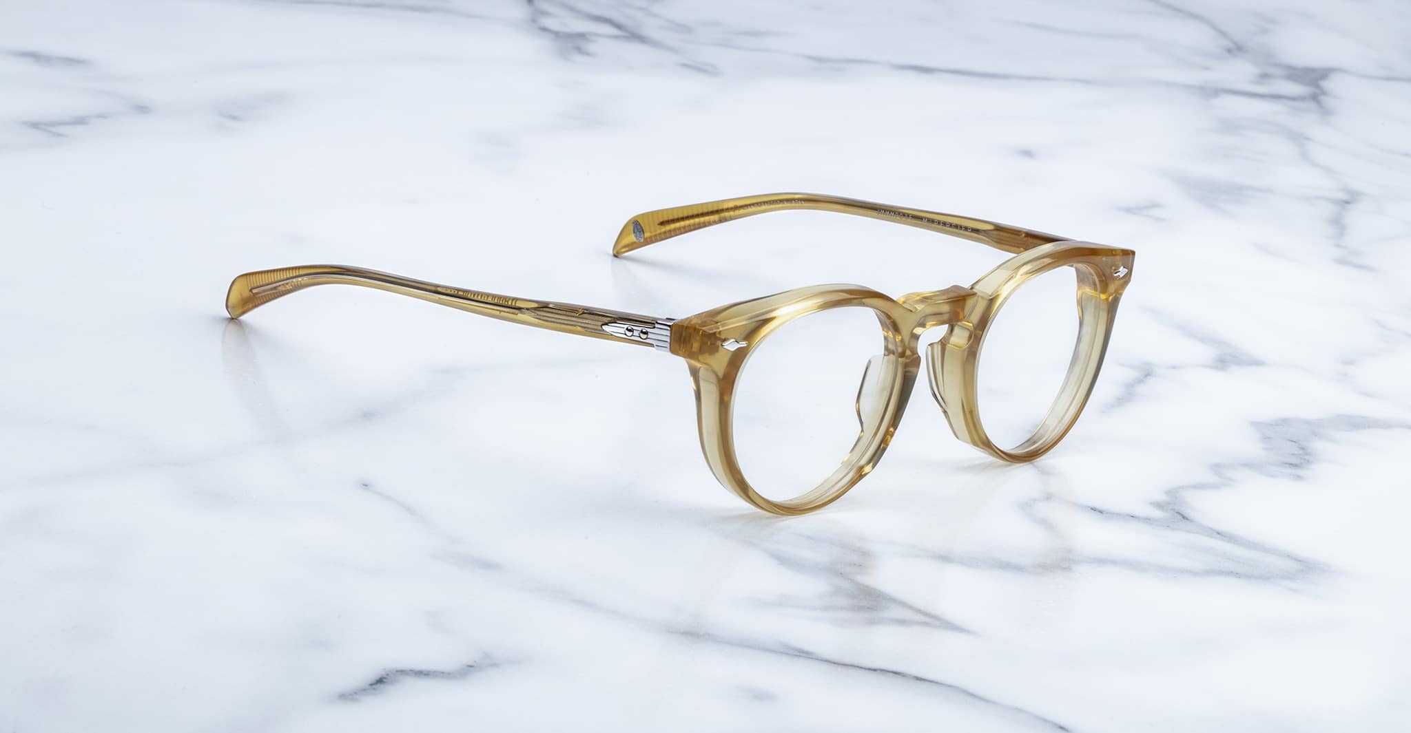 Jacques Marie Mage Percier eyeglasses, front view, by Jacques Marie Mage placed on a white marble surface.