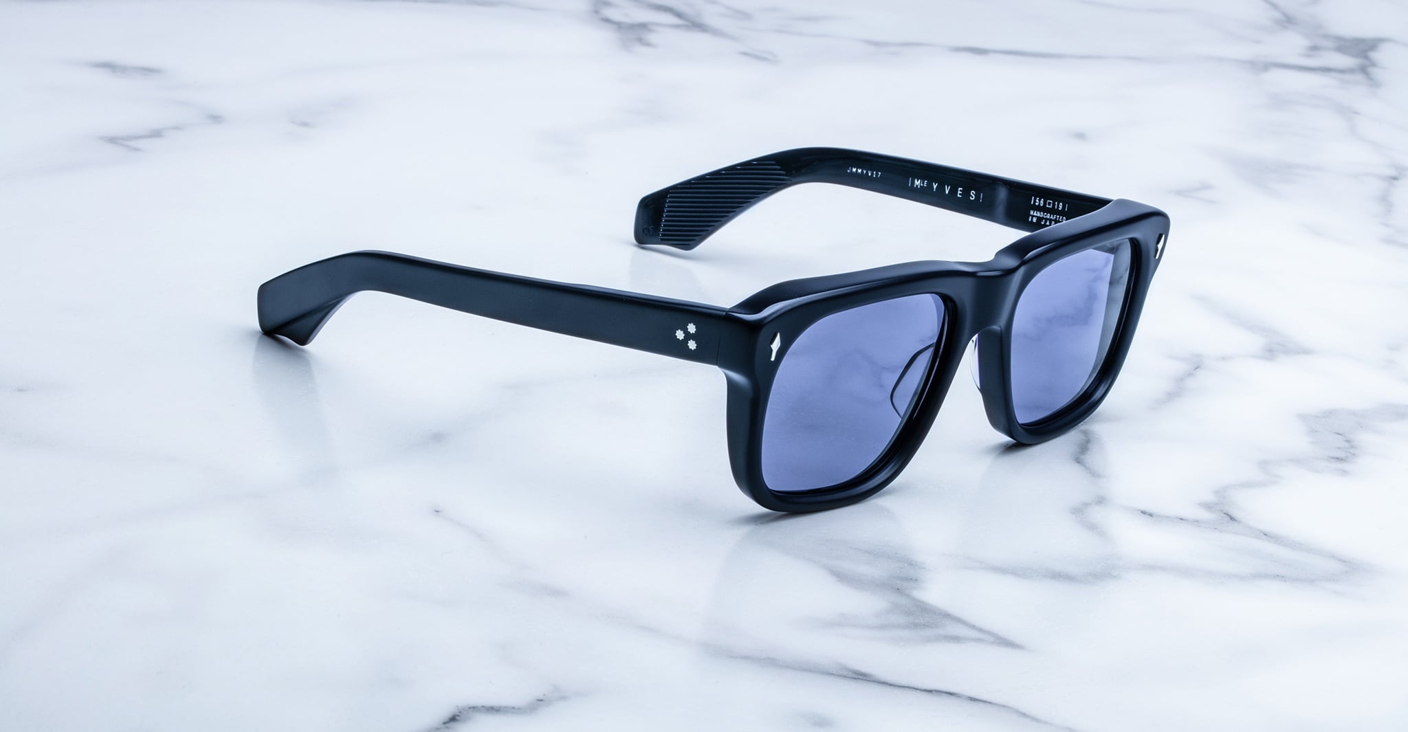 Jacques Marie Mage Yves black rectangular sunglasses with dark lenses, top view showing full frame and arms.