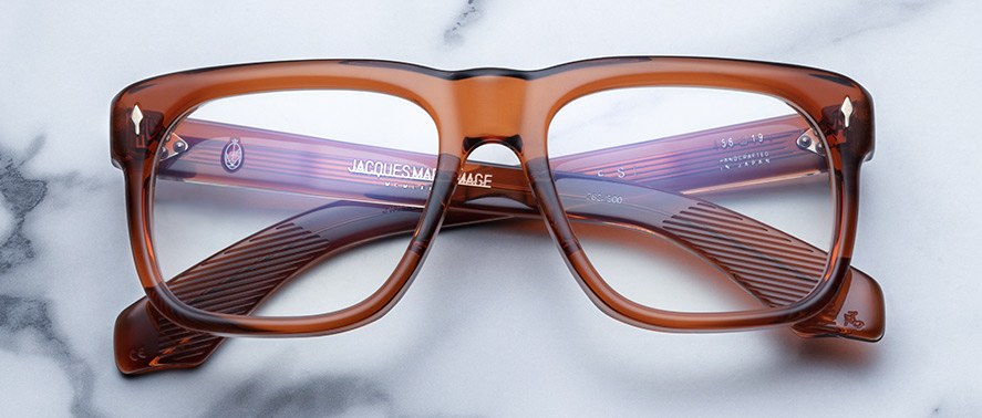 Jacques Marie Mage Yves brown rectangular eyeglasses with clear lenses, top view.
