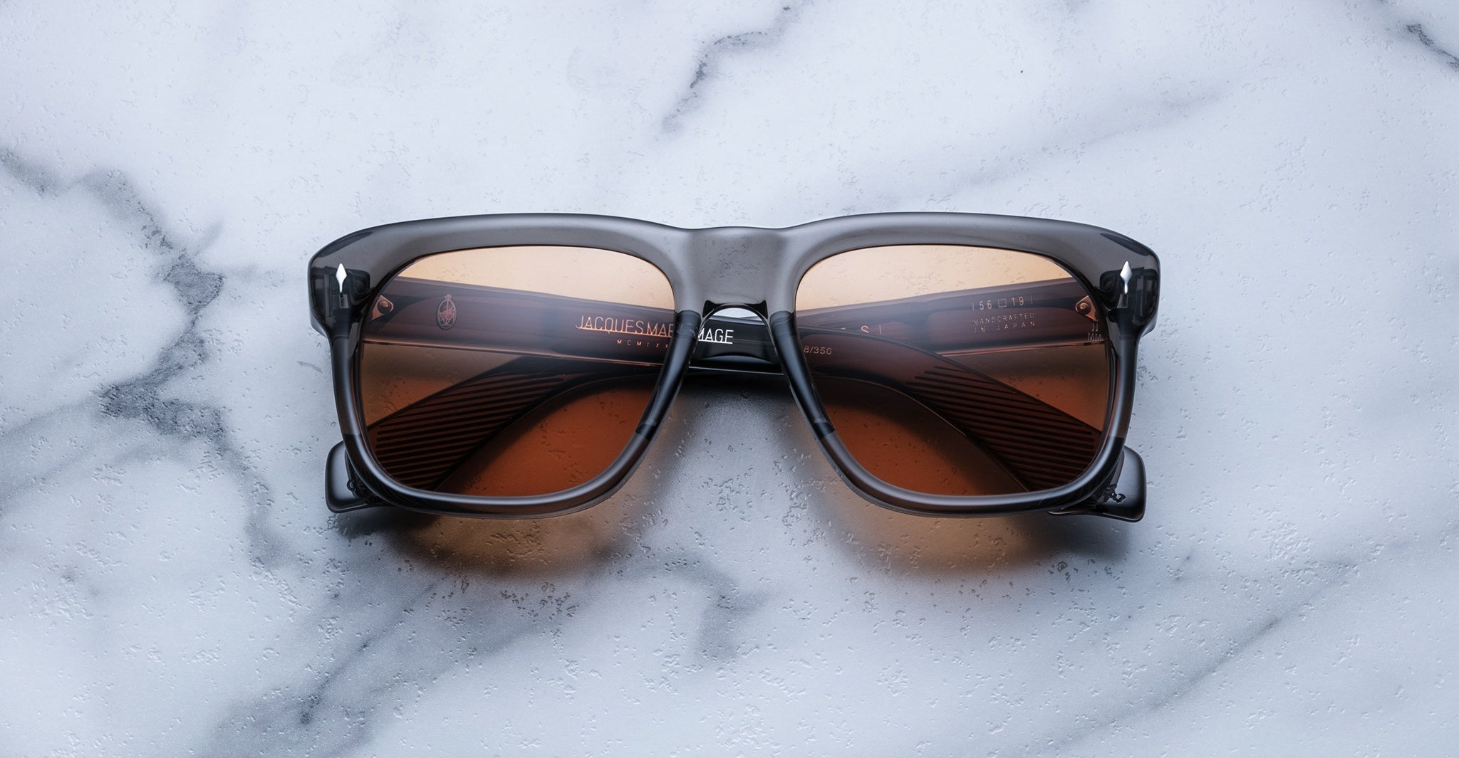 Jacques Marie Mage Yves square sunglasses with brown lenses, top view showing front and temples.