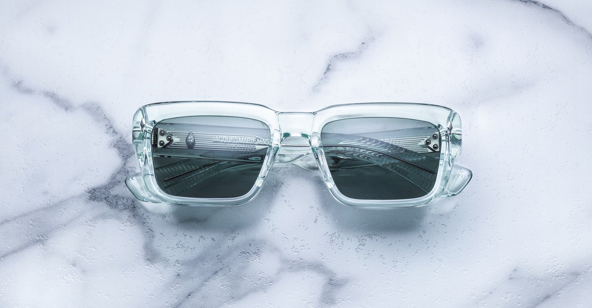 Jacques Marie Mage Walker sunglasses with UV-protection dark lenses, top view.