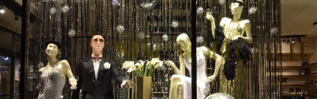 What a Spectacle Holiday Window on Sunset Blvd with sequined mannequins and eyewear by Barton Perreira
