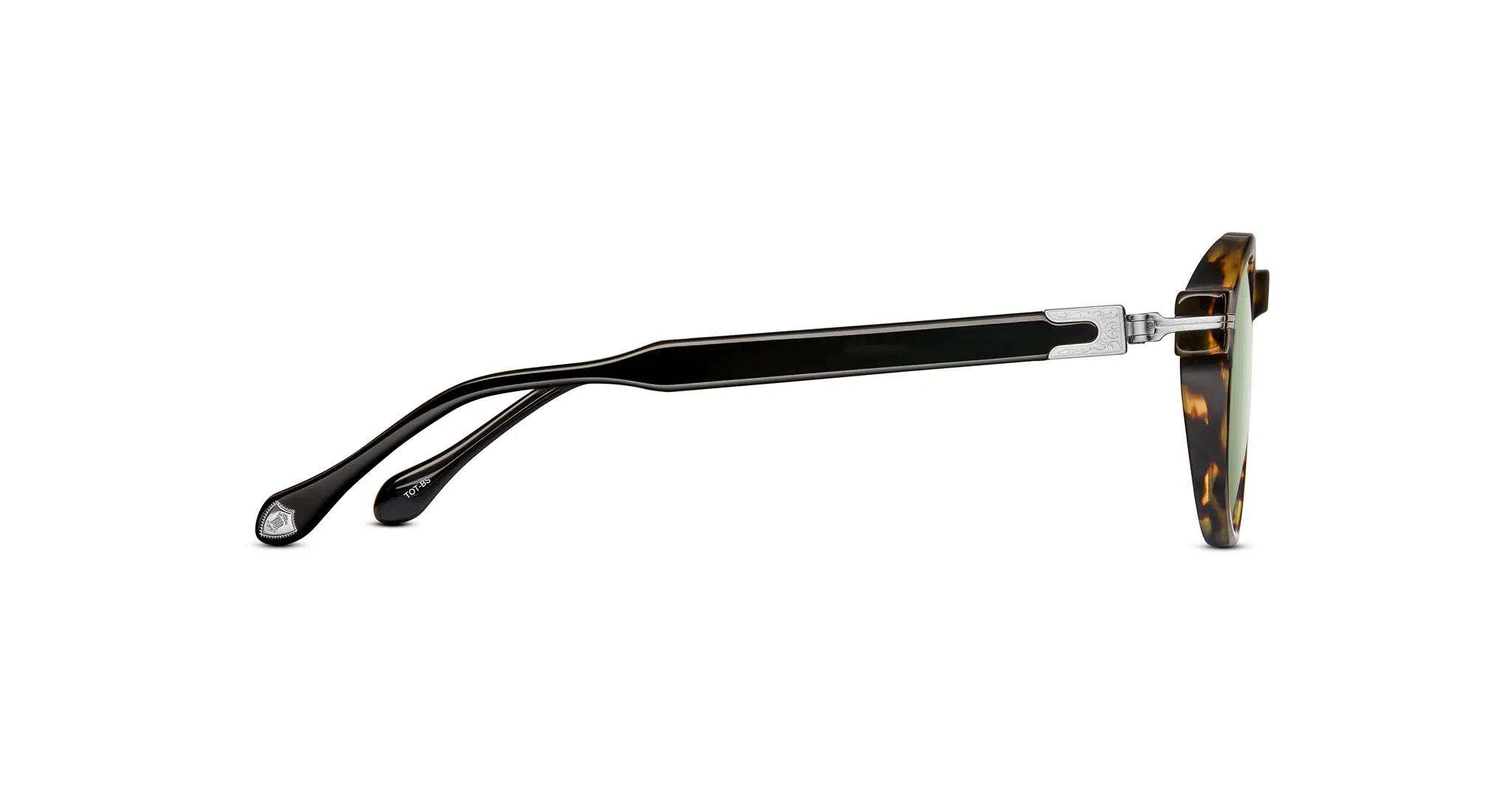 Side view of Matsuda M2050 eyeglasses with tortoiseshell-patterned round frames, sleek black arms, and metallic silver hinges, set against a white background.
