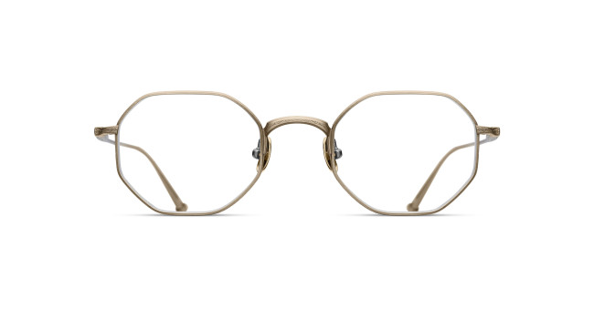 Front view of the Matsuda M3086 eyeglasses featuring thin gold metal frames and distinctive octagonal lenses, set against a white background.