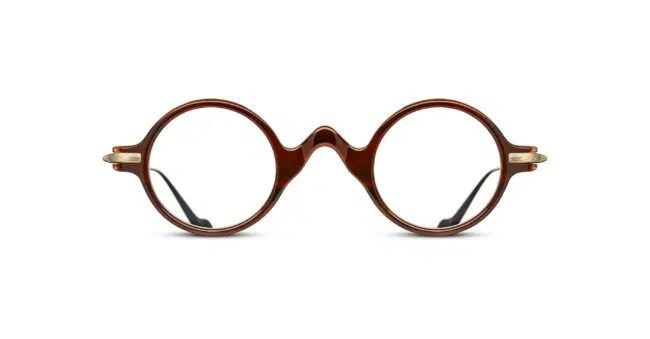 The Matsuda The Lifesaver MXMF1 features round brown frames with a keyhole bridge and gold hinge accents, shown against a white background.