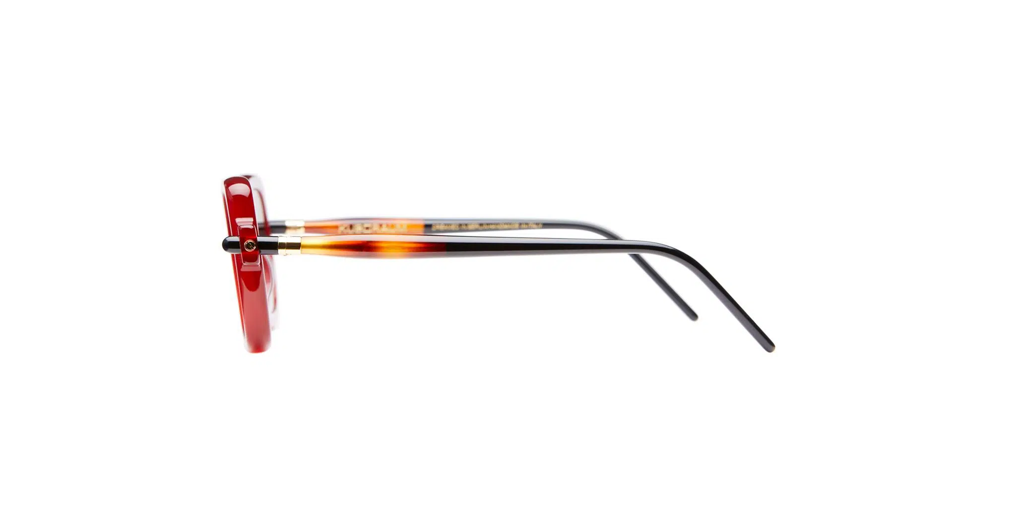 Side view of Kuboraum P4 RED eyeglasses featuring a red front with tortoise + black shine temples and red circular frames, set against a white background.