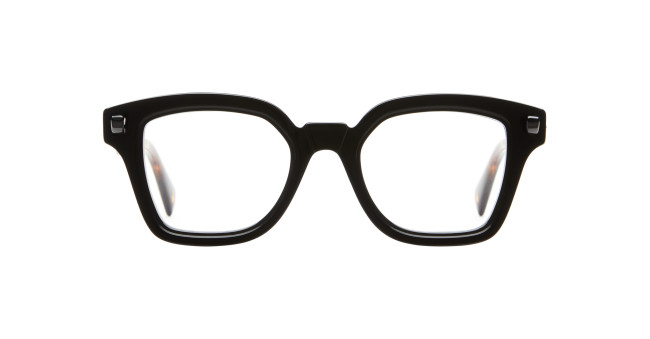 A pair of Kuboraum Q3 black, thick-rimmed rectangular eyeglasses is displayed on a plain white background.