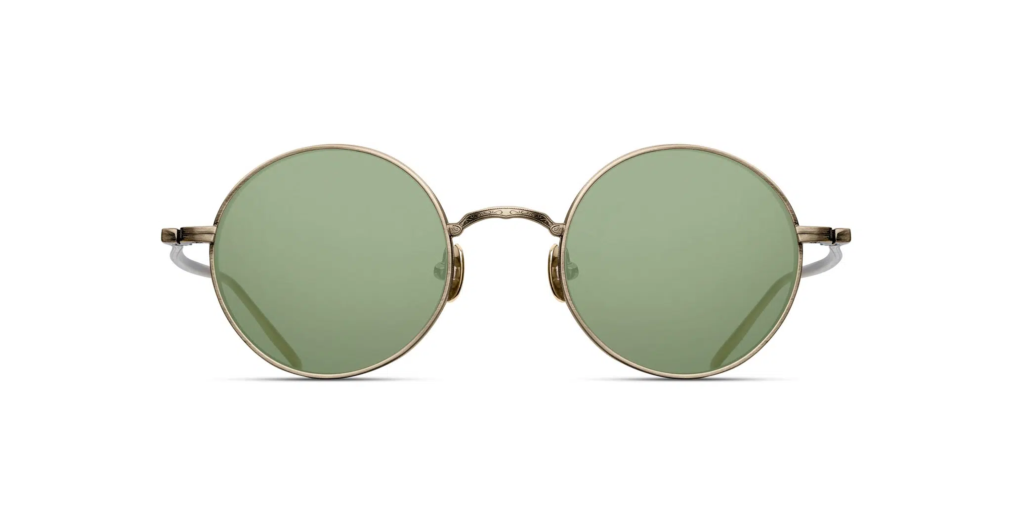 The Matsuda M3087 features round green-tinted lenses and slim metallic gold frames, displayed from the front against a white background.