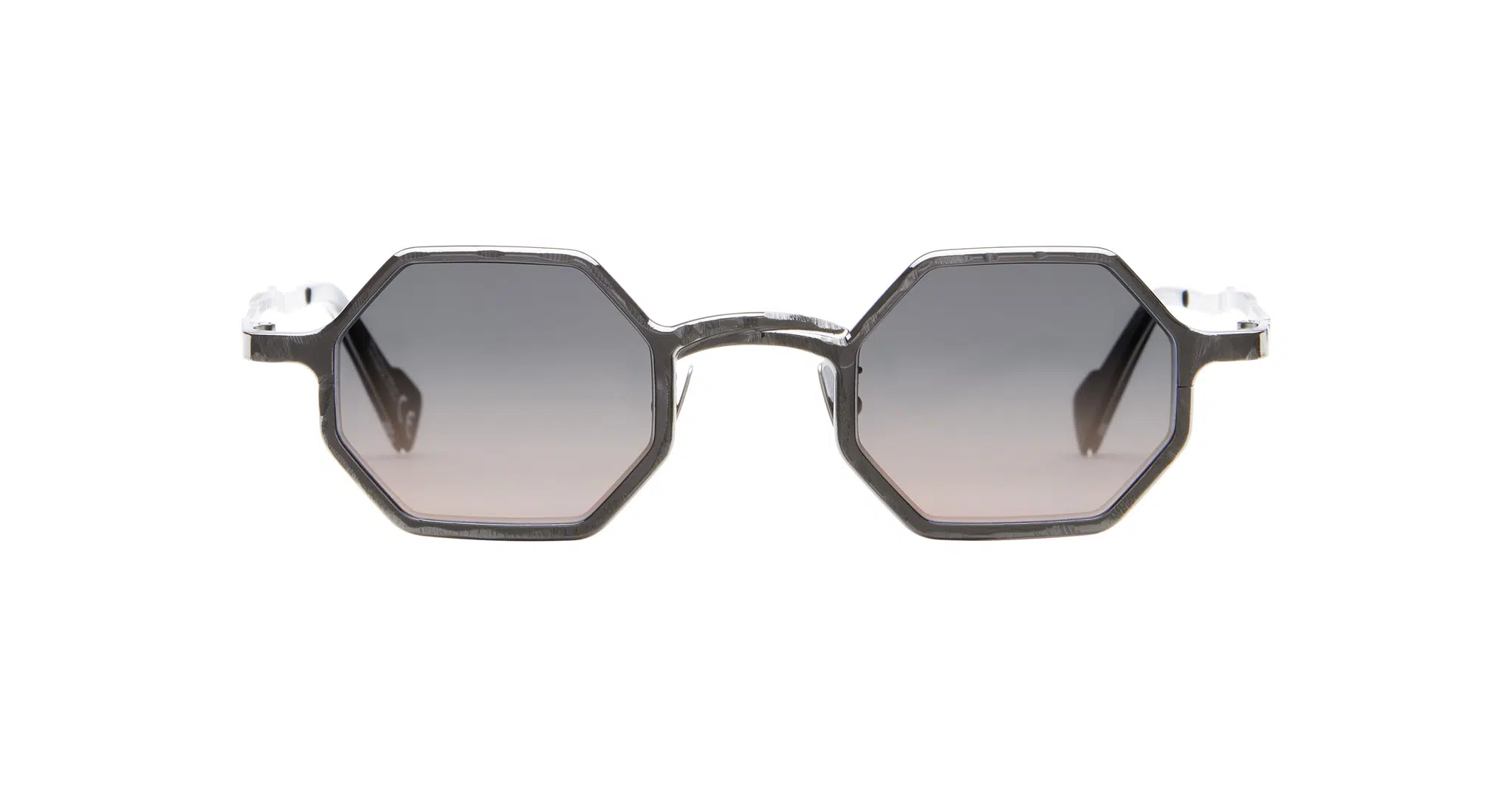 Kuboraum-Z19-GMG-Gun-Metal-KRSZ19GMG00000GF-Front-Dan-Deutsch Front view of Kuboraum Z19 geometric hexagonal sunglasses with dark gradient lenses and transparent gray frames, displayed on a white background.
