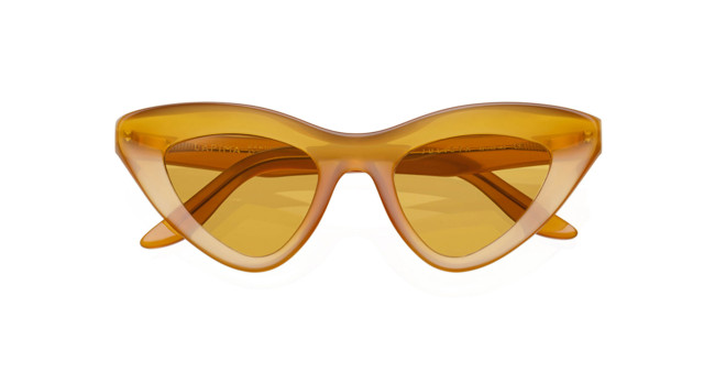 Lapima Julieta cat-eye sunglasses featuring thick, translucent amber frames and matching amber-tinted lenses, displayed against a white background.