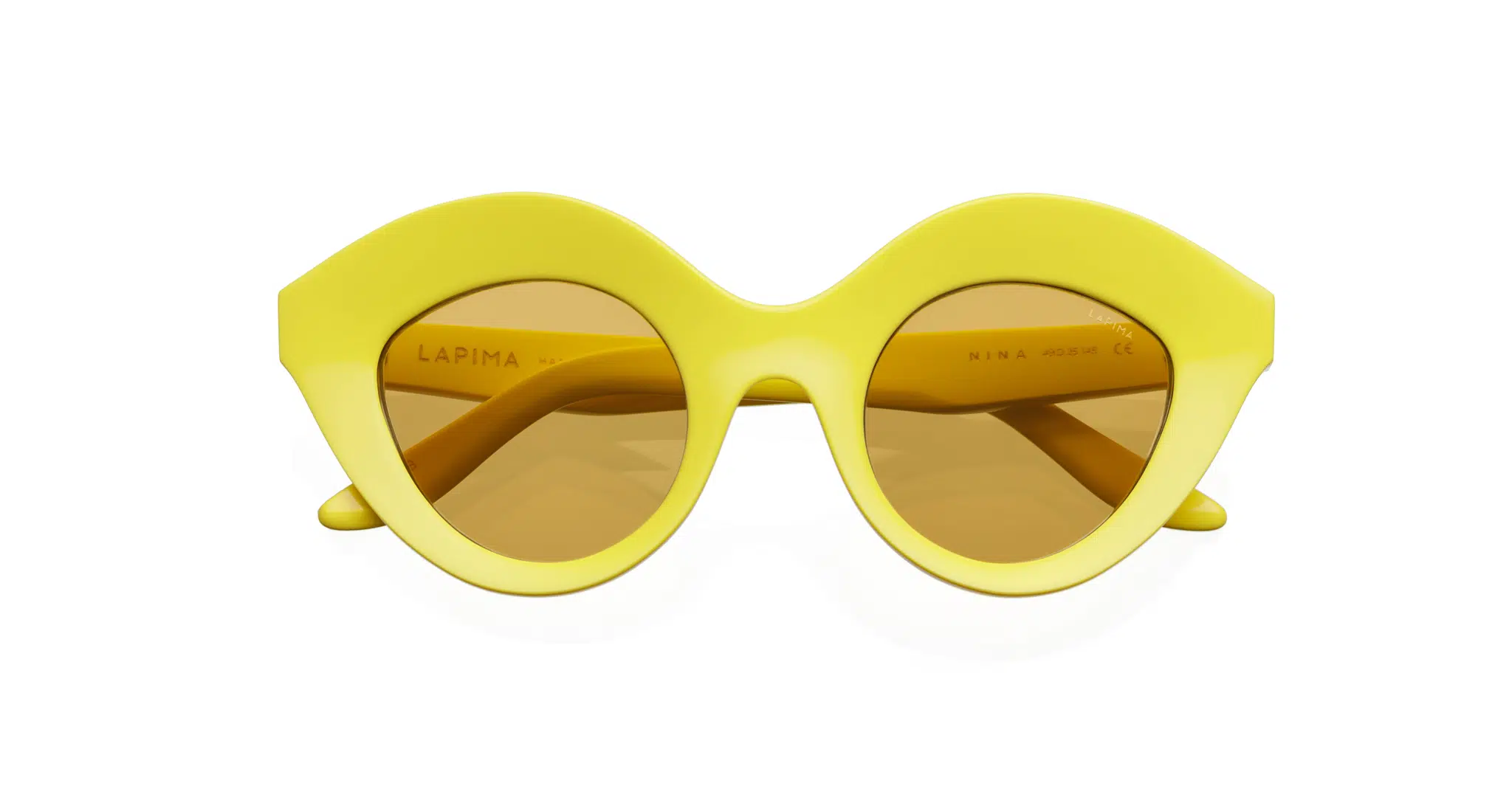 The Lapima Nina sunglasses feature thick, glossy round yellow frames with brown-tinted lenses and the Lapima brand name on the left inner arm.