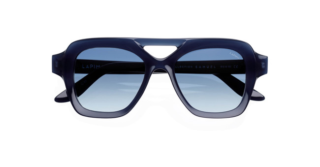 Lapima Samuel sunglasses feature bold, oversized square frames in dark blue. Shown from the front against a white background, these aviator-style shades have thick rims and gradient blue lenses.