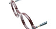 A close-up of Kuboraum P1 eyeglasses featuring round, thick burgundy rims and dark green arms, set against a white background.