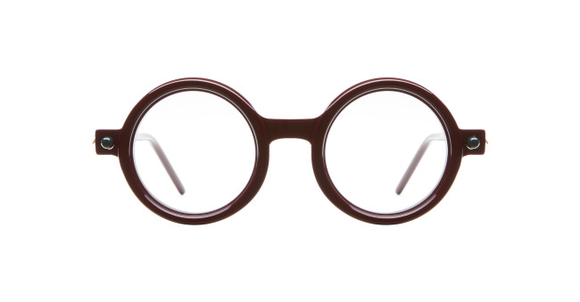 Kuboraum P1 round brown eyeglasses with clear lenses and a thick frame, shown front-facing against a white background.