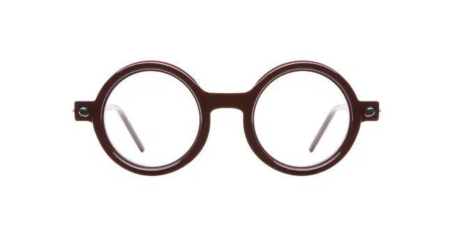 Kuboraum P1 round brown eyeglasses with clear lenses and a thick frame, shown front-facing against a white background.