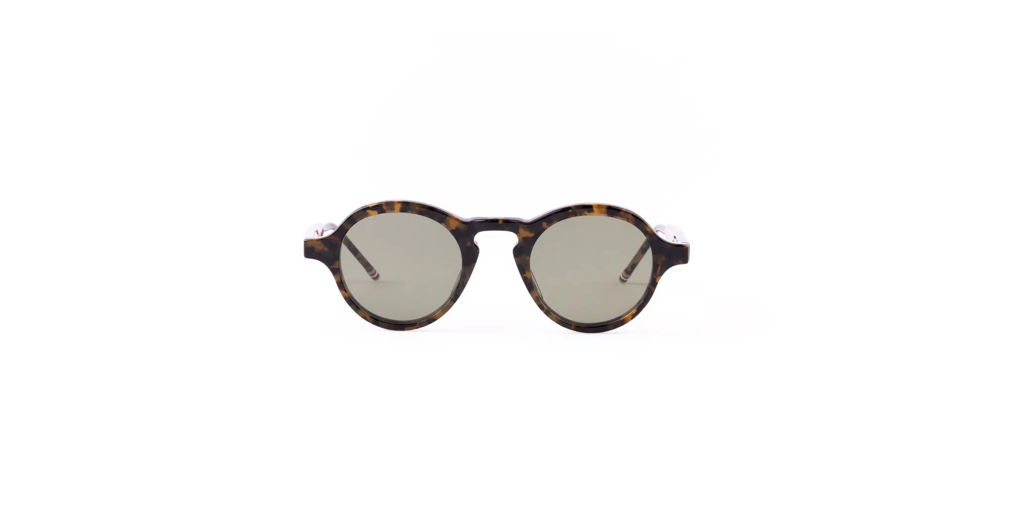 Thom Browne 926 round sunglasses with dark lenses and a tortoiseshell-patterned frame, shown on a plain white background.