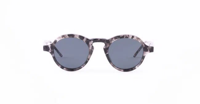 Thom Browne 926 round sunglasses with dark lenses and a marbled gray and black patterned frame, displayed on a plain white background.