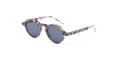 Thom Browne 926 round sunglasses feature dark lenses and a marbled gray frame, displayed on a white background.