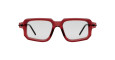 Kuboraum P23 bold square eyeglasses feature translucent red frames and clear lenses, seen from the front. The black temples are partially visible.