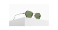 The Matsuda M3153 sunglasses, featuring green lenses and a metal frame, are displayed on a white rectangular pedestal against a plain white background.