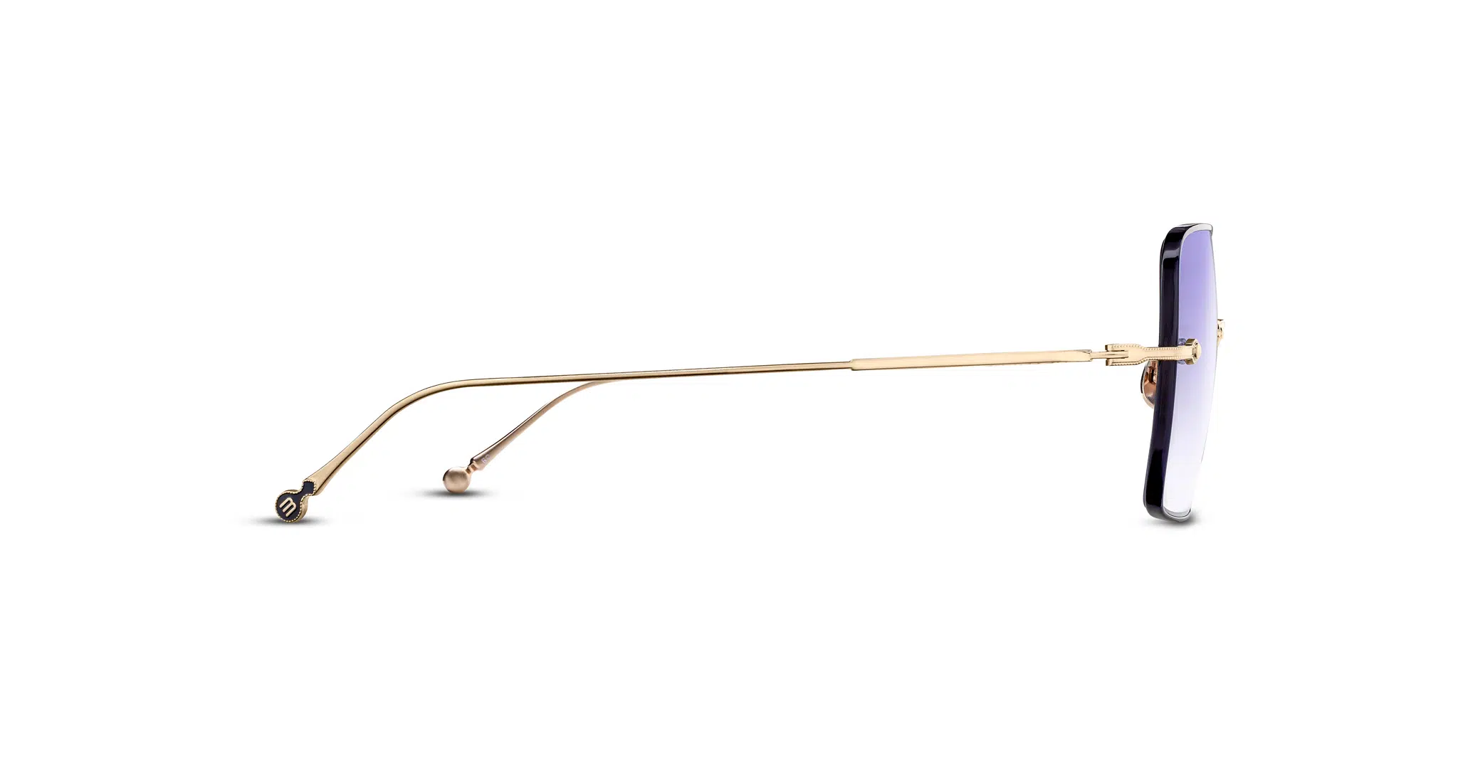 Matsuda-M5005-Brushed-Gold-M5005.SG.BG.55-Side-Dan-Deutsch Side view of Matsuda M5005 eyeglasses featuring thin gold metal arms and rimless lenses, displayed against a white background.