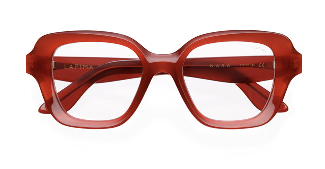 A pair of red, rectangular eyeglasses with thick frames. The brand LAPIMA and model NARA are visible on the inside of the temples. The lenses are clear and the arms are also made of thick red material.