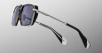 A pair of Jacques Marie Mage GT-R sunglasses featuring modern rectangular thick black frames, dark tinted lenses, and slim metallic arms, photographed against a plain grey gradient background.