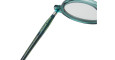 Close-up of the teal-colored arm of a pair of eyeglasses, with the words Hamburger Bahnhof and other text printed in yellow-green along the side. The clear lens and part of the round frame are visible.