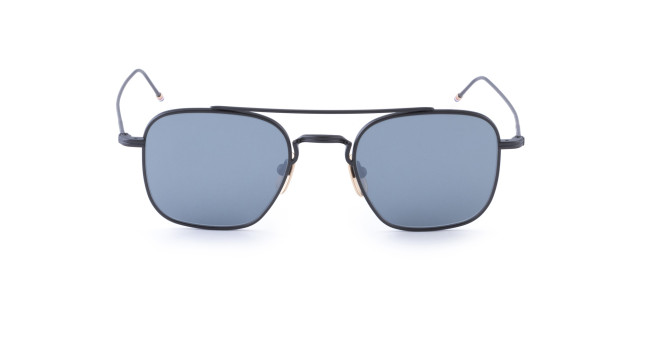 Front view of Thom Browne Sunglasses featuring square, blue-tinted lenses and a thin black metal frame. The slim temples curve slightly at the ends, complemented by a double bridge above the nose pads.