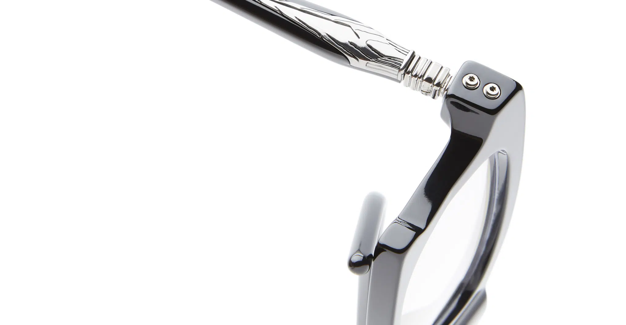 Close-up of the Kuboraum D75 eyeglass frame in black and silver, highlighting its shiny metal hinge and decorative temple against a white background.