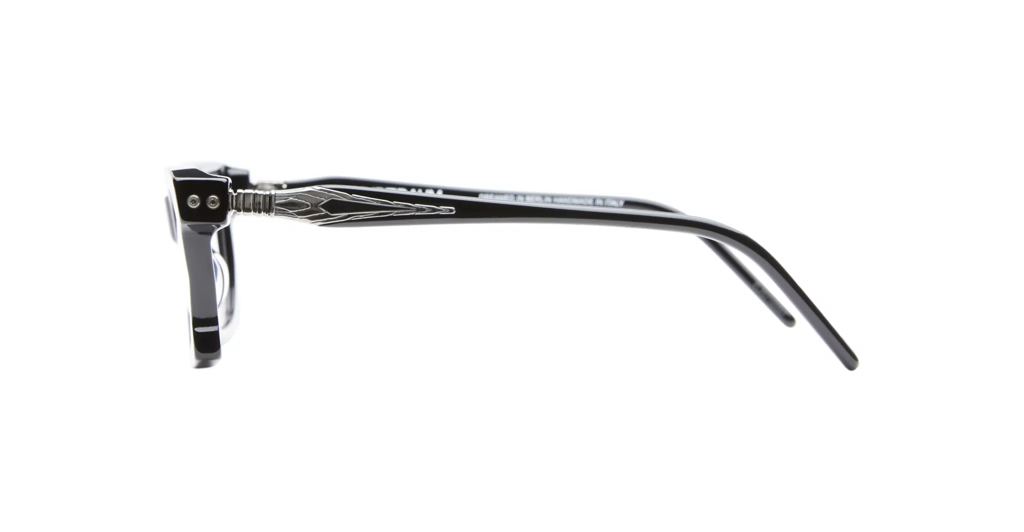 Side view of Kuboraum D75 black eyeglasses featuring a silver engraved metal detail on the temple arm, photographed against a white background.