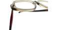 Close-up of Kuboraum P20 beige square eyeglass frames with thick rims, highlighting the corner hinge and one red and black temple arm extending outward.