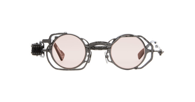 Kuboraum Z50 round steampunk sunglasses with pink lenses, metal frame, side shields, and gear-like temple detailing, displayed on a white background.
