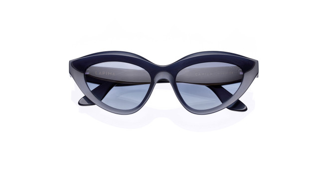 Front view of Lapima Camila cat-eye sunglasses in dark blue, featuring thick frames and blue-tinted lenses, displayed on a white background.