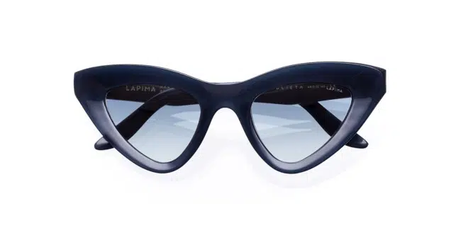 Dark blue cat-eye sunglasses with thick frames and gradient tinted lenses, displayed on a white background.