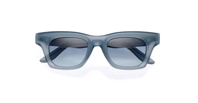 Front view of a pair of rectangular sunglasses with light blue translucent frames and dark blue tinted lenses, set against a white background.