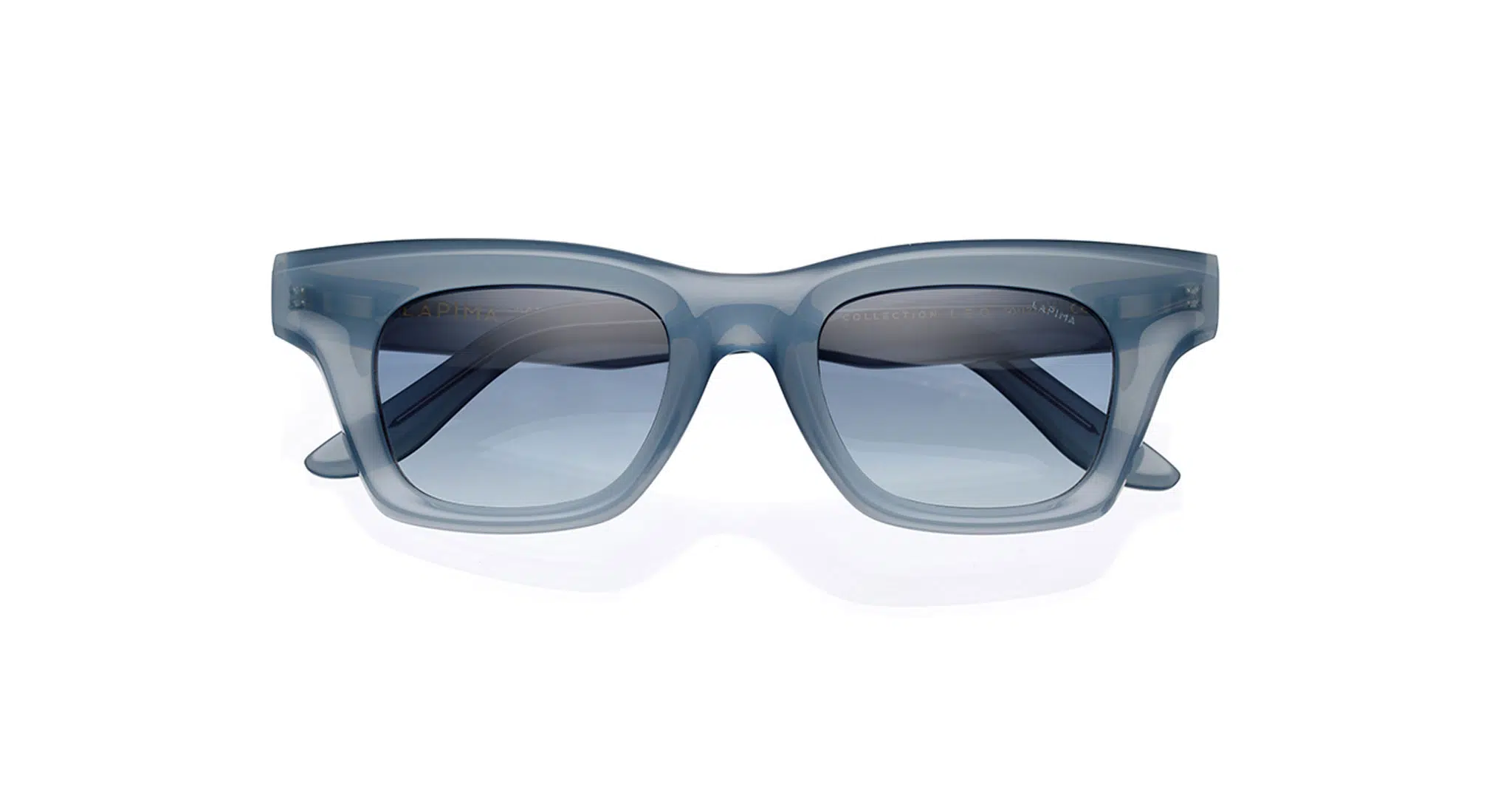 Lapima-Leo-Atlantic-Celeste-2070545402-Dan-Deutsch Front view of a pair of rectangular sunglasses with light blue translucent frames and dark blue tinted lenses, set against a white background.