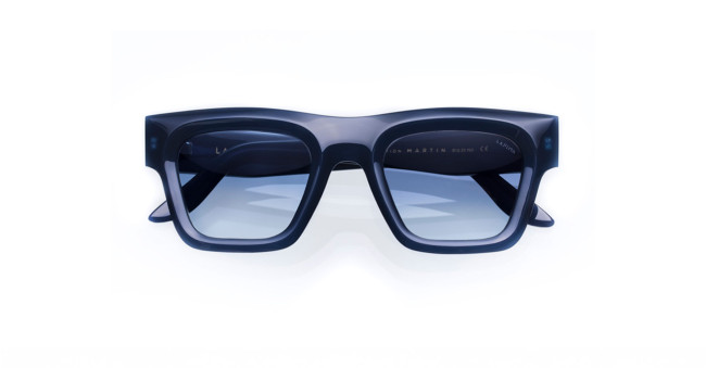 Lapima Martin sunglasses with a rectangular shape, thick dark blue frames, and blue-tinted lenses are shown facing forward on a white background.