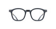 Front view of Matsuda M2068 black round eyeglasses with thick frames and clear lenses, featuring small decorative metal accents at the upper corners, set against a white background.